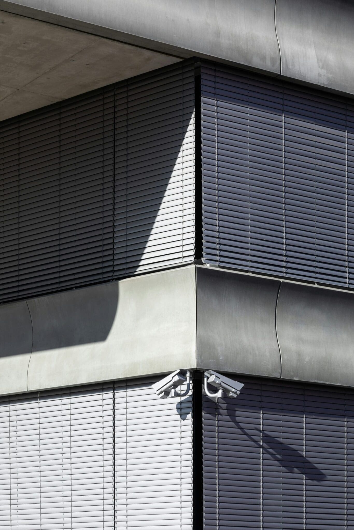 a cctv on the wall of a building